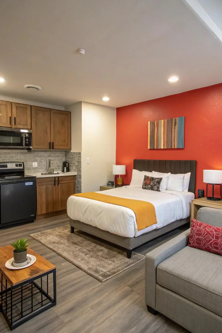 Accent walls add character and separate living spaces visually.