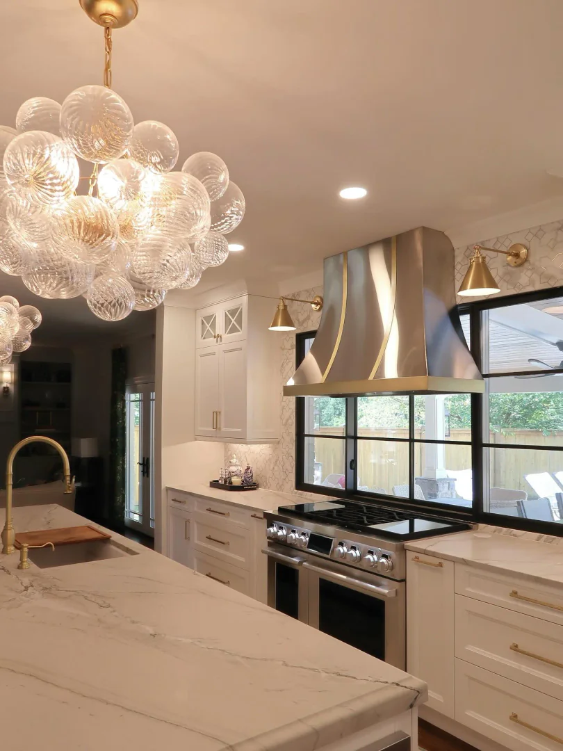 10. Golden Glamour with Sculptural Lighting (Kitchen Lighting Ideas)