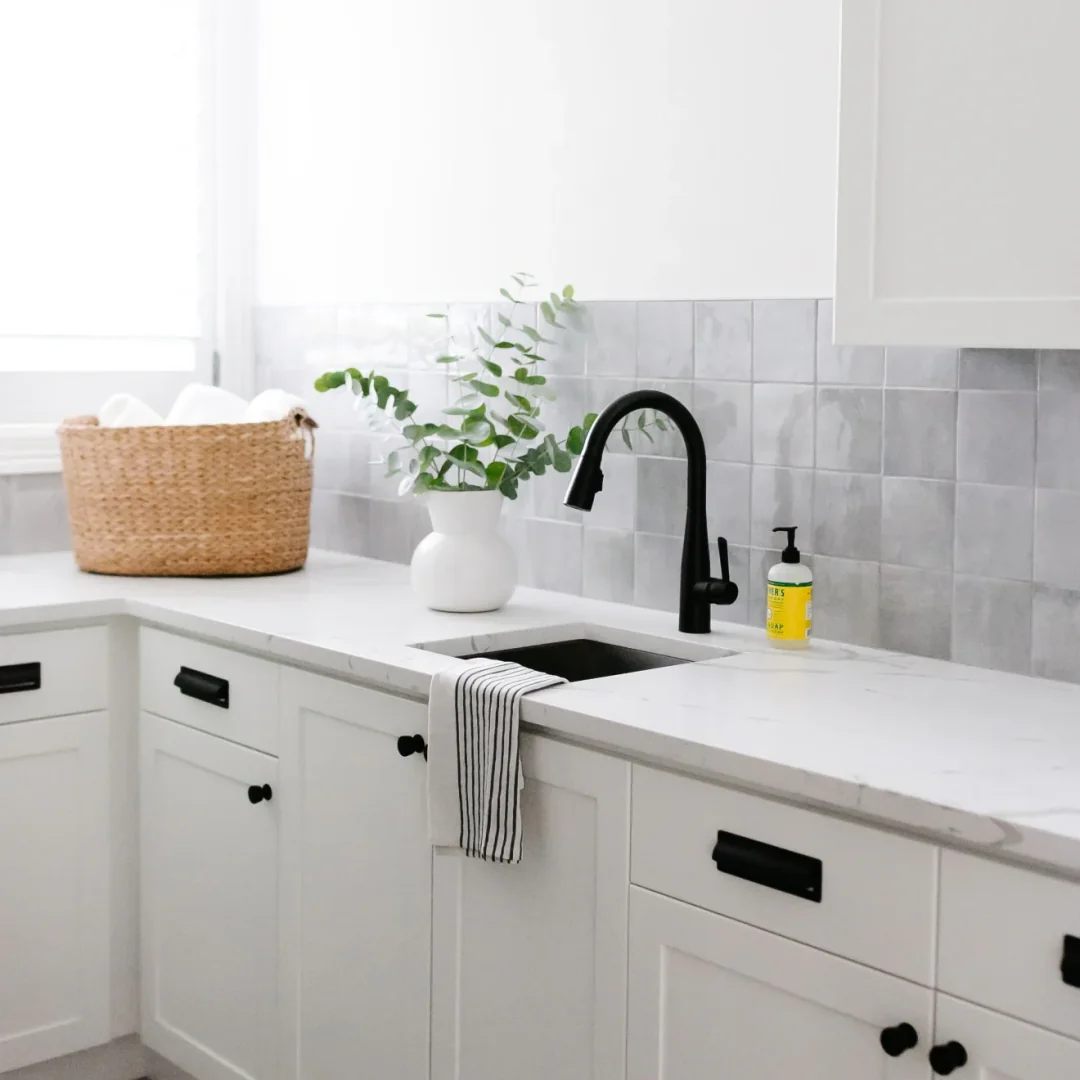 11. Soft Gray Square Tile with Matte Black Accents (Gray Kitchen Backsplash Ideas)