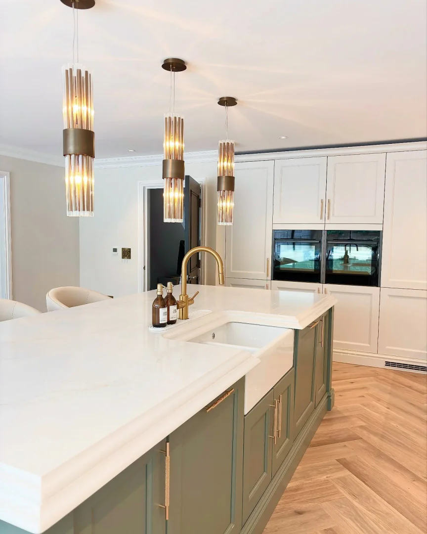 12. Warm Brass and Soft Sage Harmony (Kitchen Lighting Ideas)