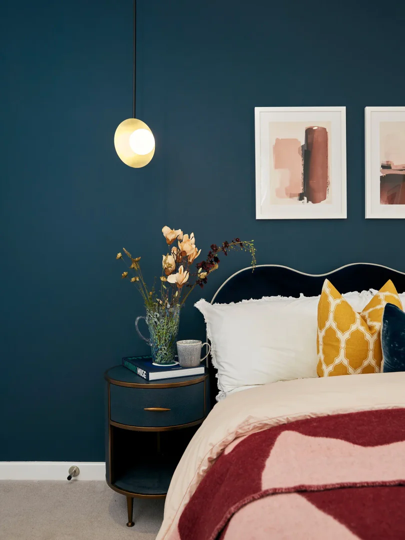 13. Bold Blue Bedroom with Vibrant Accents (Blue Wall Bedroom Ideas)