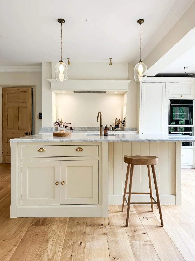 13. Understated Neutrals with Glass Pendants (Kitchen Lighting Ideas)
