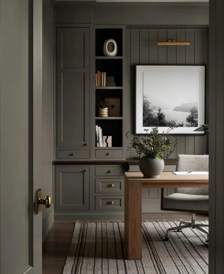 2. Charcoal Paneling with Brass Accents (Dark Home Office Ideas)