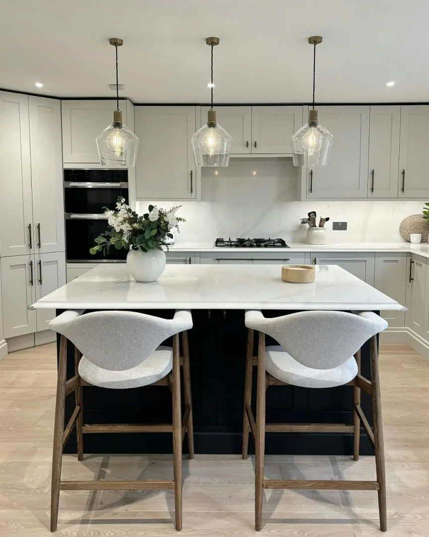 4. Refined Neutrals with a Contemporary Edge (Kitchen Lighting Ideas)