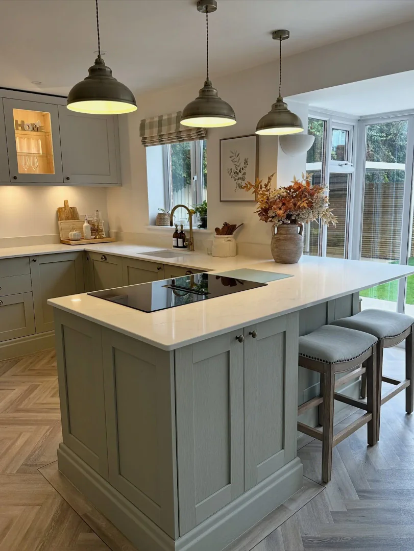 8. Soft Greens with Rustic Industrial Touches (Kitchen Lighting Ideas)