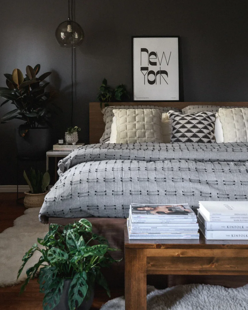 1. Modern Texture and Typography (Grey Wall Bedroom Ideas)
