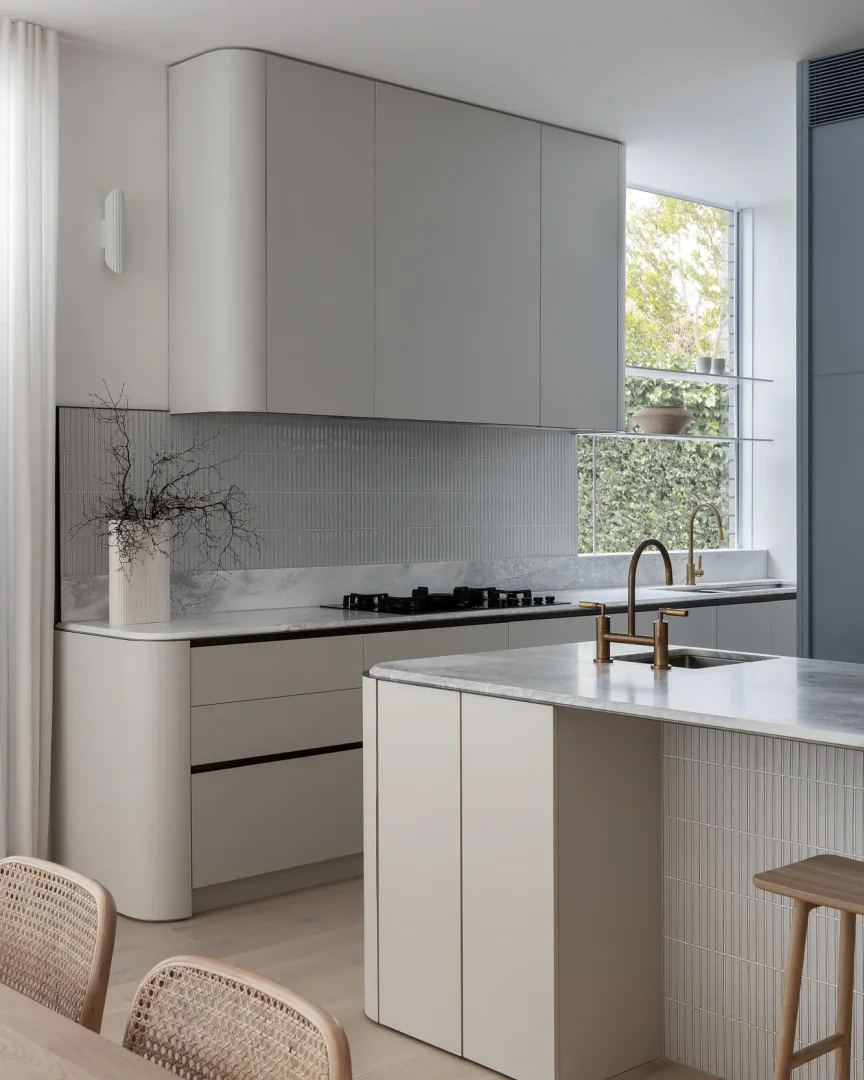 1. Sleek Minimalism with Integrated Brass Accents (Light Gray Kitchen Ideas)