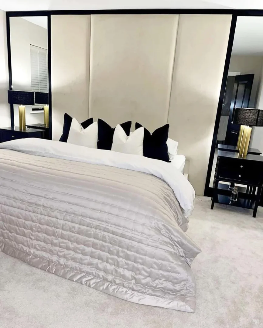 10. Framed Neutral Opulence (Black and Cream Bedroom Ideas)