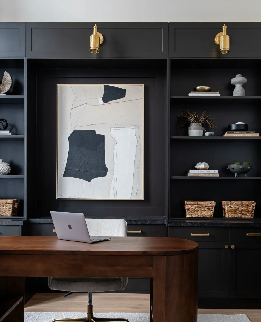 12. Modern Art-Focused Workspace (Black Office Ideas)