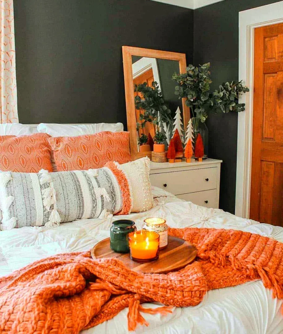 12. Modern Autumn Bedroom with Bold Orange Accents (Fall Bedroom Ideas)