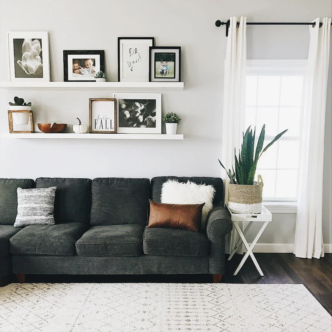13. Casual Contrast with Floating Frames (Living Room Shelf Ideas)