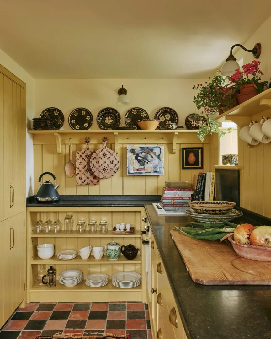 13. Rustic Pantry Style in Soft Yellow and Terracotta (Yellow Kitchen Ideas)