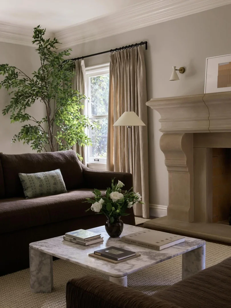 13. Stone Neutrality with Timeless Texture (Traditional Living Room Ideas)