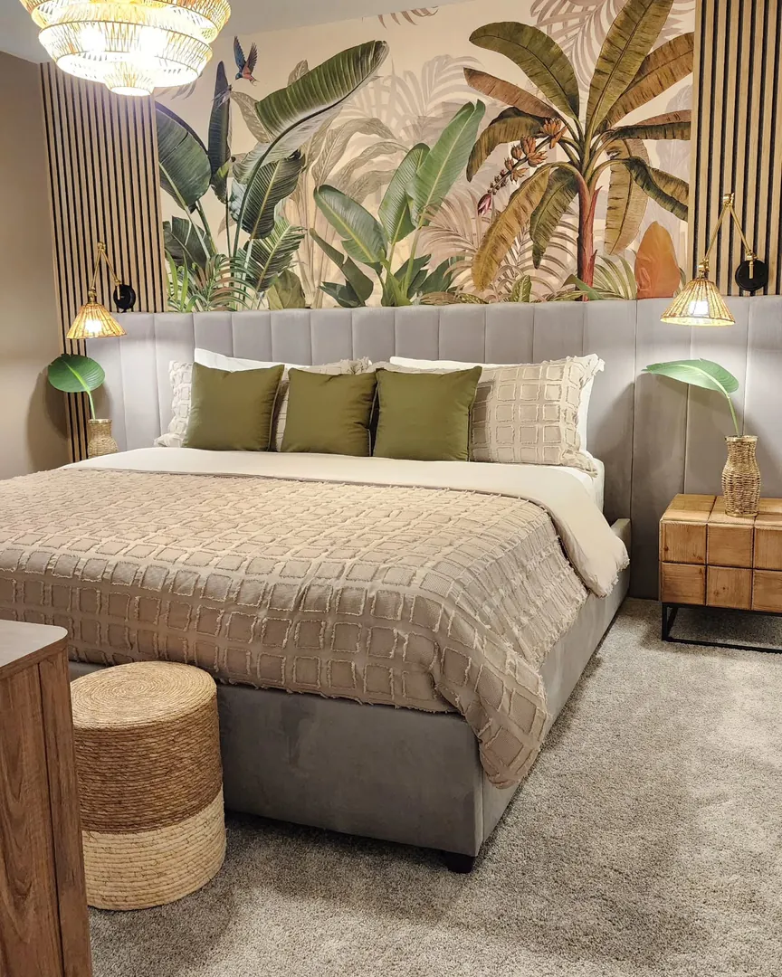 13. Tropical Statement with Textured Layers (Greenery Bedroom Ideas)