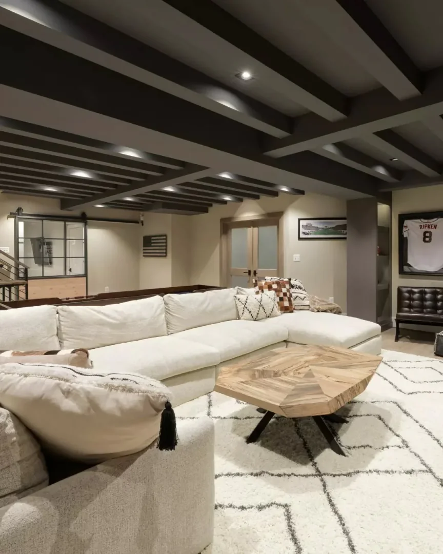 13. Warm Neutrals with Architectural Detail (Basement Living Room Ideas)