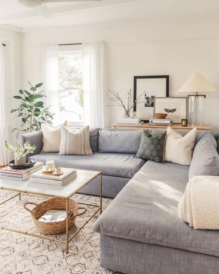 14. Soft White with Relaxed Neutrals (Paint Ideas for Living Room)