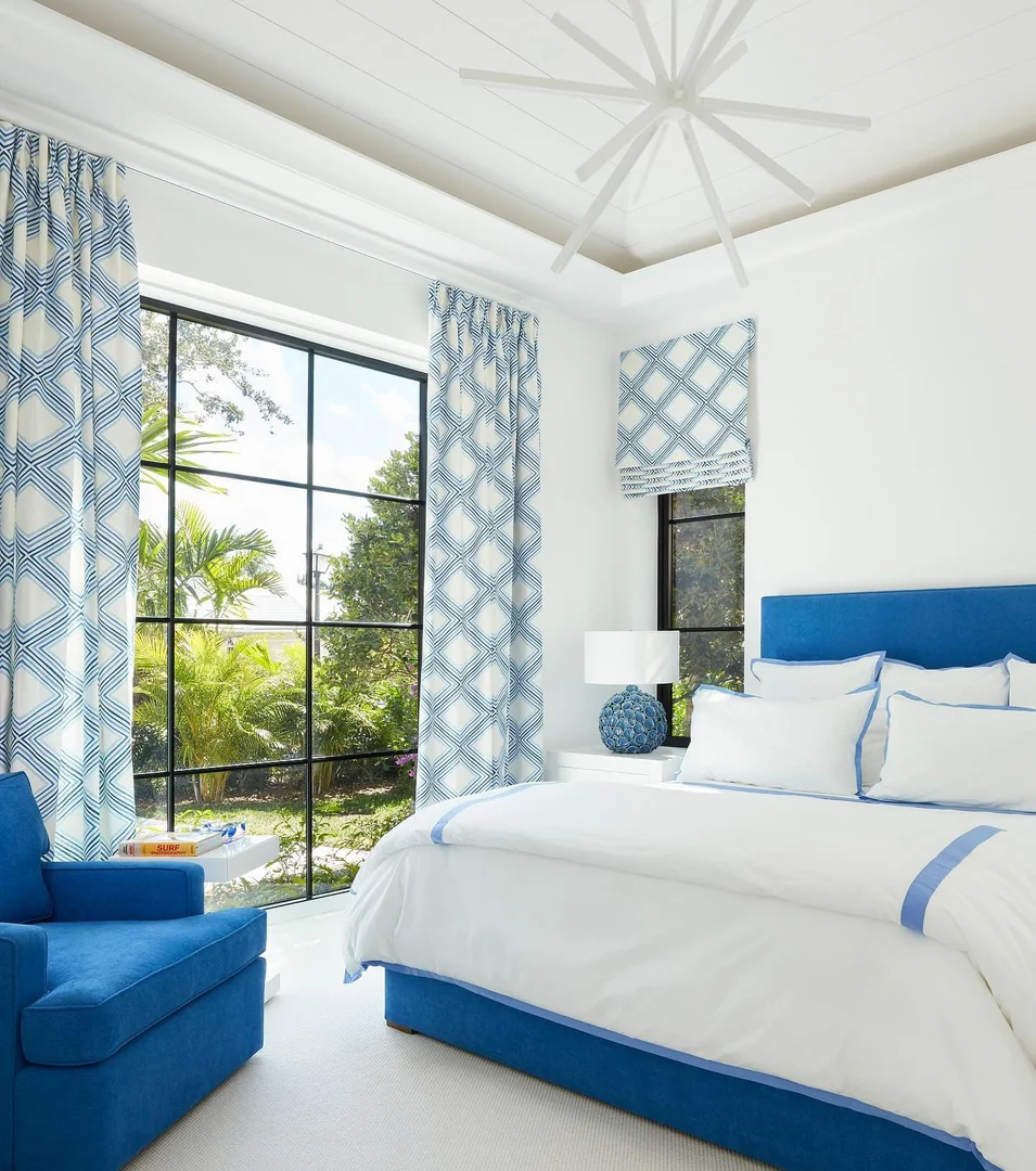 18. Crisp Contrast with Geometric Drapery (Blue and White Bedroom Ideas)