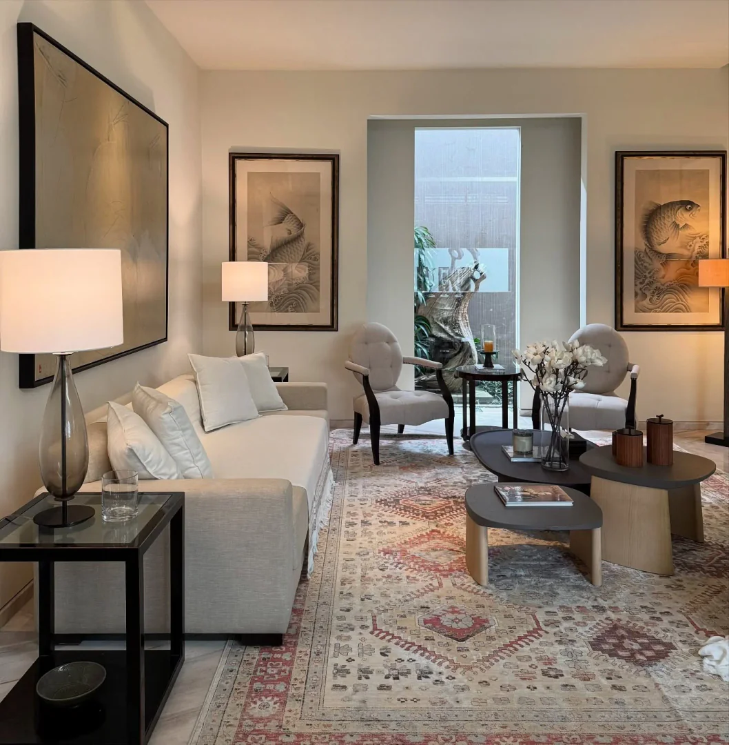2. Classic Neutrals with Eastern Influence (Living Room Carpet Ideas)