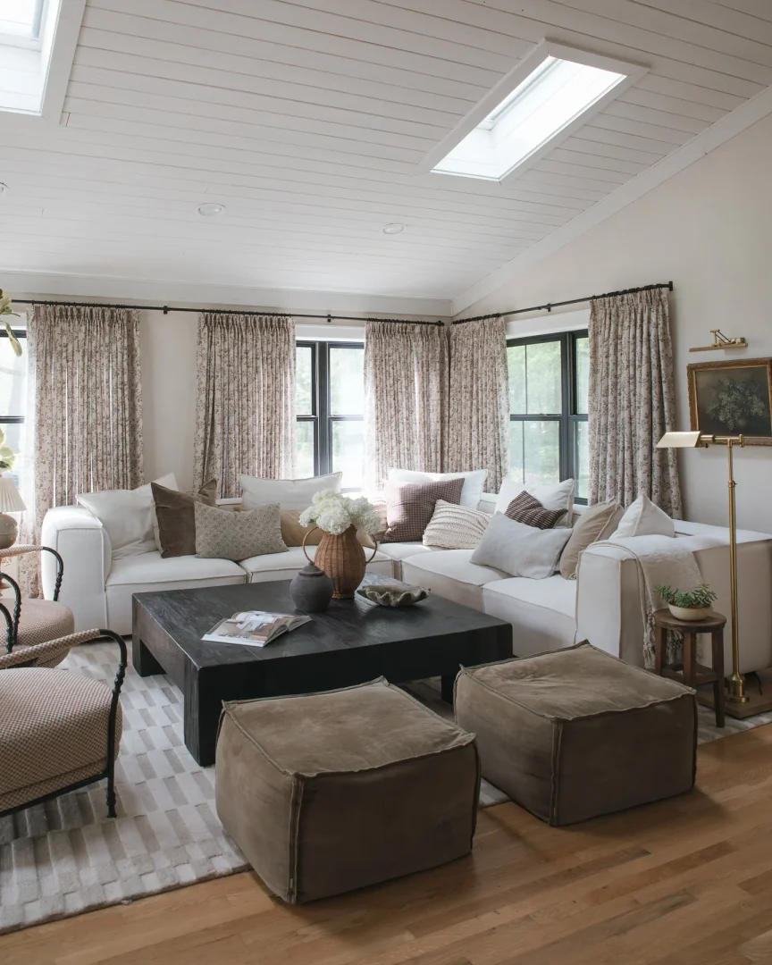 3. Classic Comfort with Patterned Elegance (Basement Living Room Ideas)