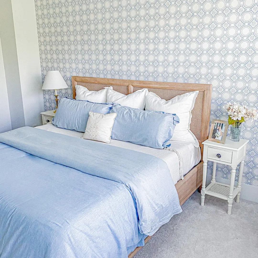 4. Geometric Charm with Soft Blues (Blue and White Bedroom Ideas)