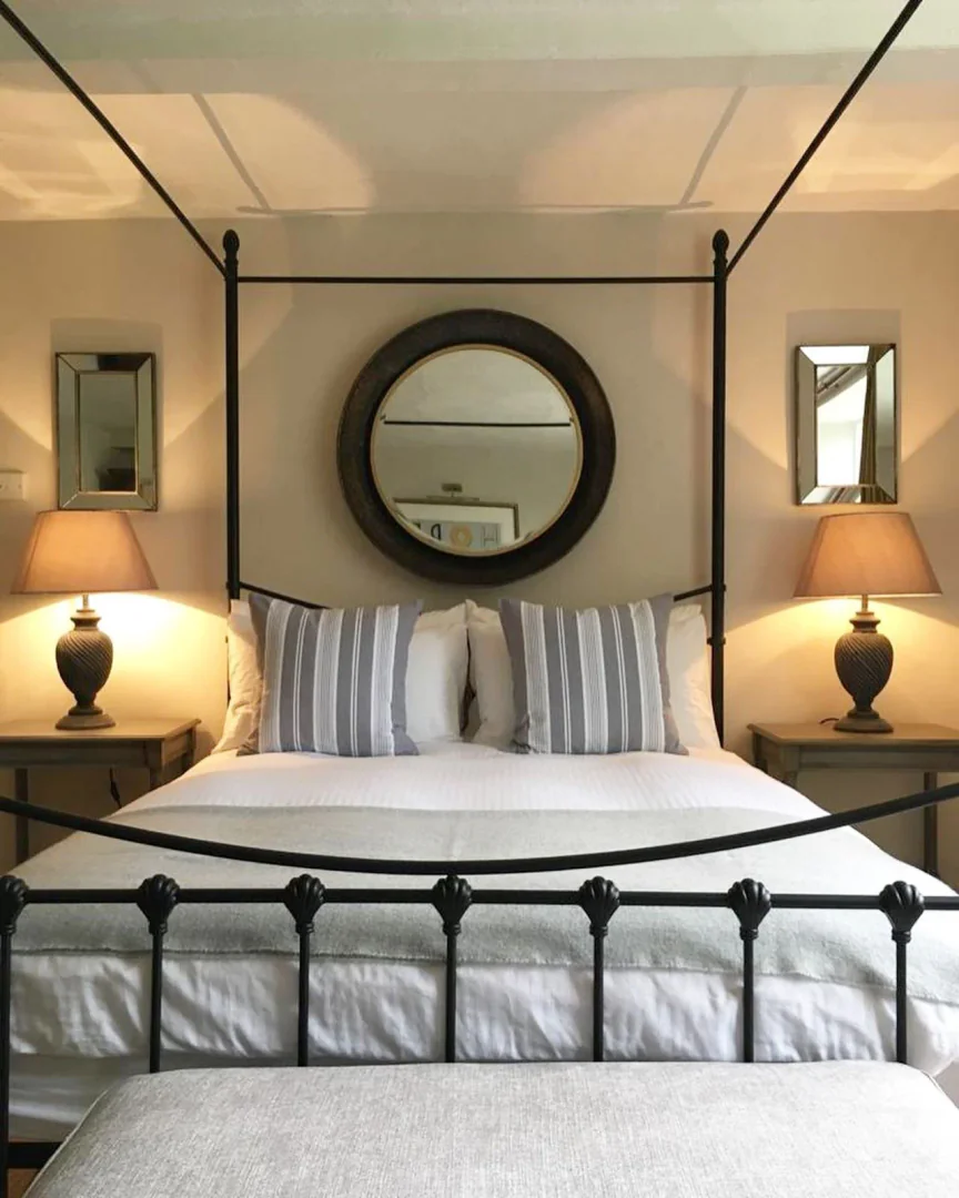 4. Refined Traditional with Canopy Charm (Metal Bed Frame Bedroom Ideas)