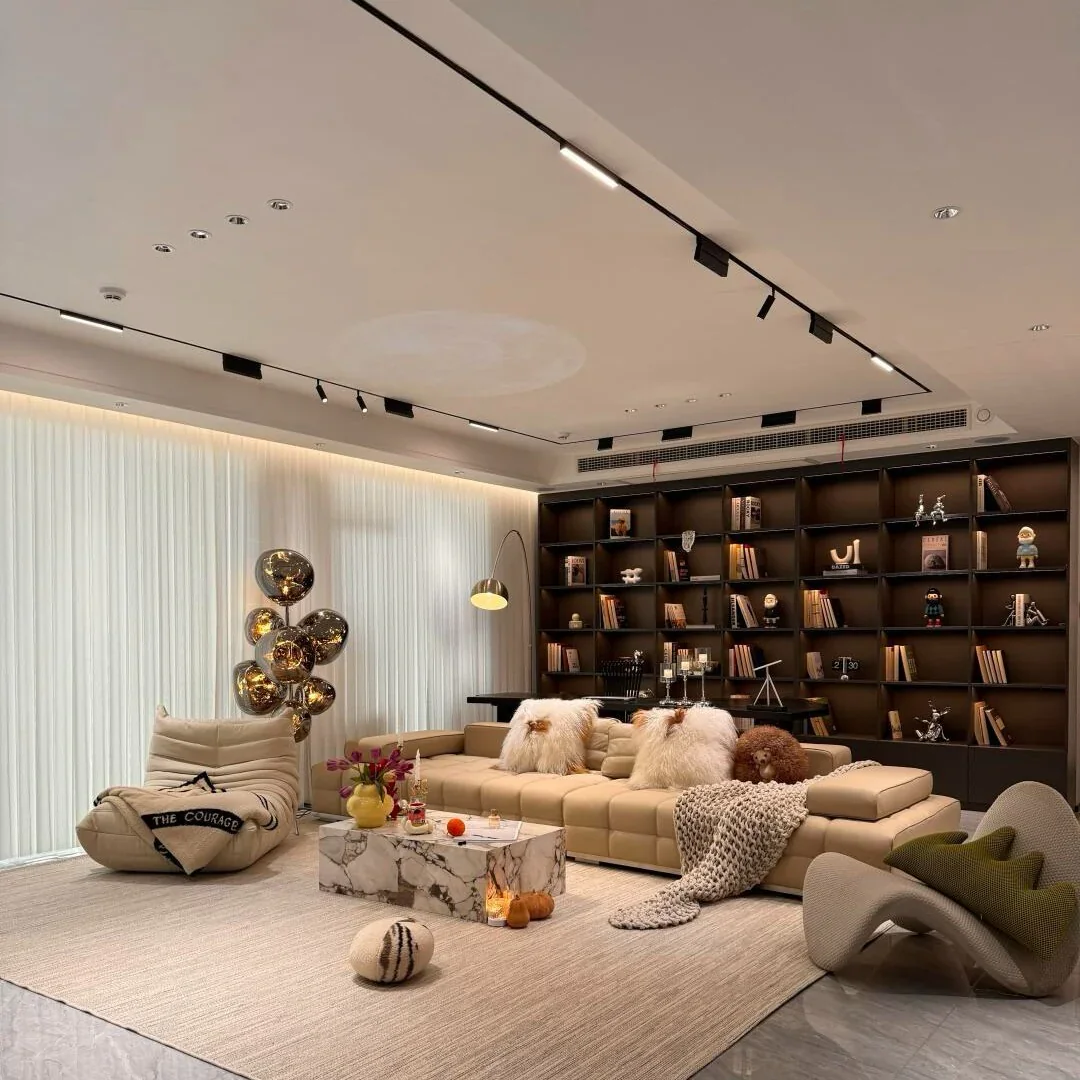5. Chic Lounge with Sculptural Elements (Living Room Sofa Ideas)