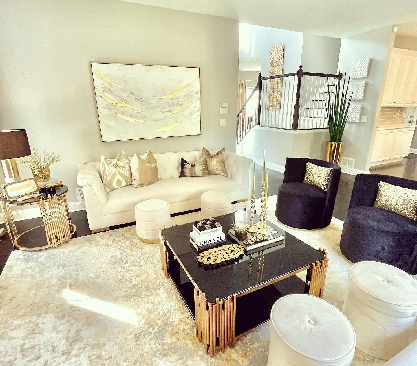 5. Polished Neutrals with Dramatic Contrast (Gold Living Room Ideas)