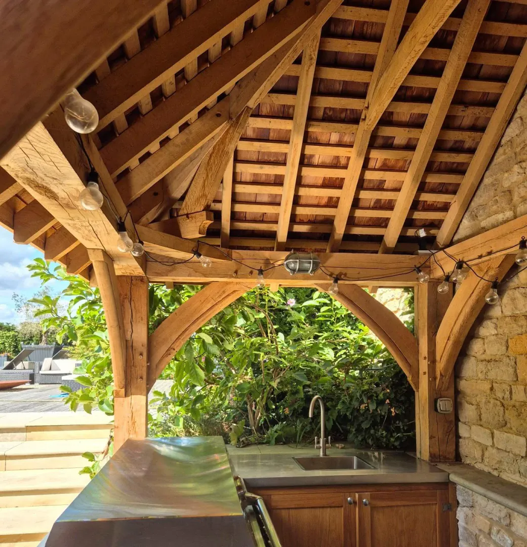 6. Traditional Oak-Framed Outdoor Kitchen (Rustic Outdoor Kitchen Ideas)