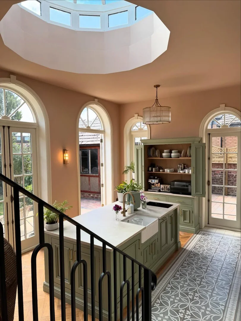 7. Classic Elegance in Soft Sage (Open Lounge Kitchen Ideas)