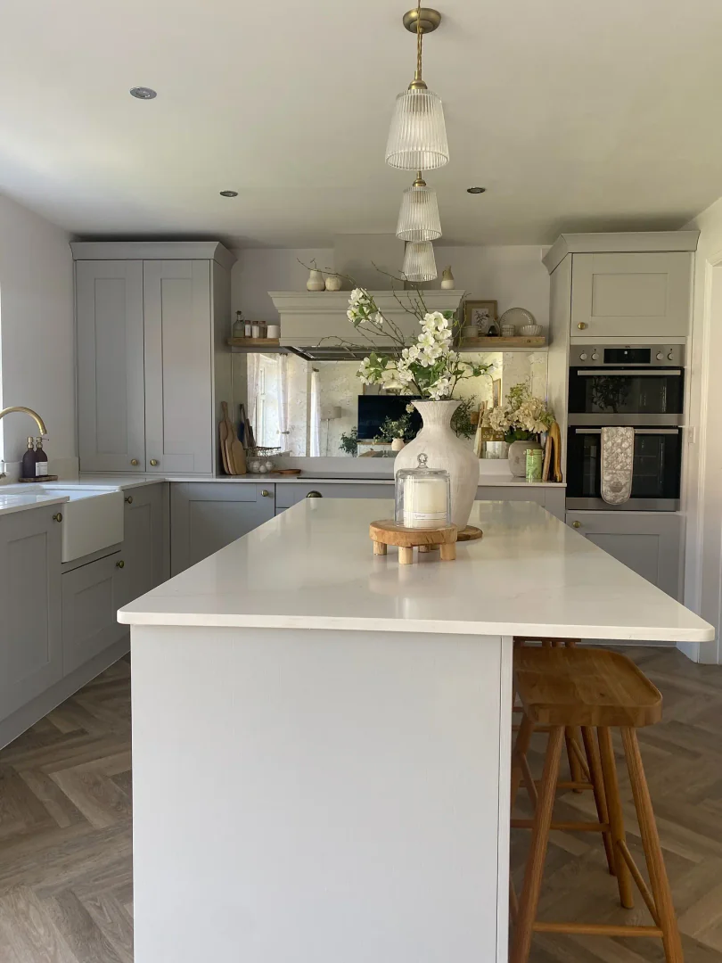 8. Cozy Country-Inspired Charm with Modern Amenities (Light Gray Kitchen Ideas)