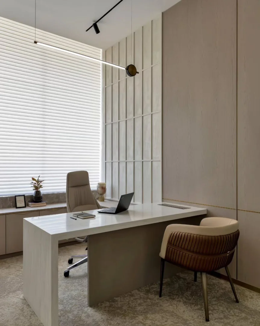 8. Crisp White Office with Modern Detailing (Corporate Office Ideas)